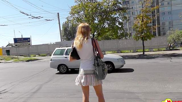 Public upskirt with a pretty slender teen