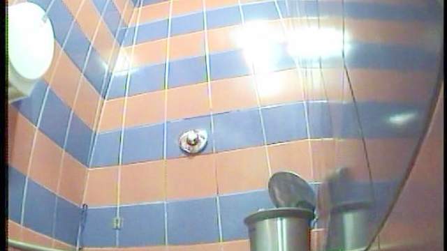 Blonde is taking off her panties and pissing