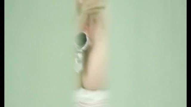 Spicy brunette in the medical chair with voyeur cam