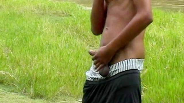 Black gay is masturbating outdoors in a solo video