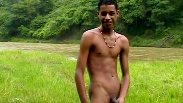 Black gay is masturbating outdoors in a solo video
