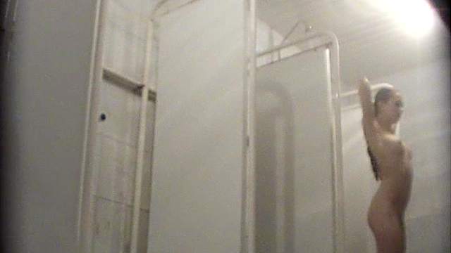 Spicy wet babe is taking shower in the voyeur vid