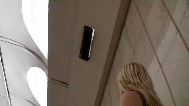 Stunning upskirt with spicy blonde in voyeur video