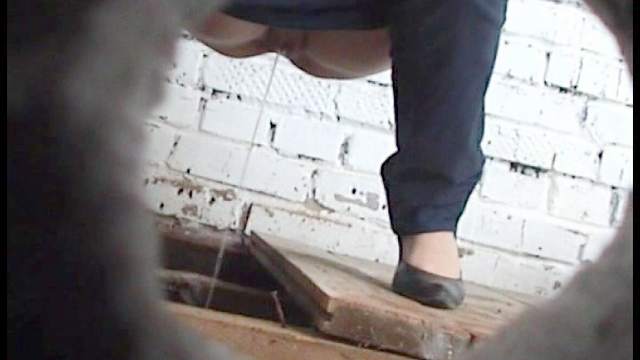 Stunning beauty is pissing in the voyeur scene