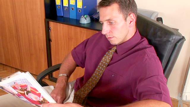 Bruinette Lily Cross gives a blowjob in the office