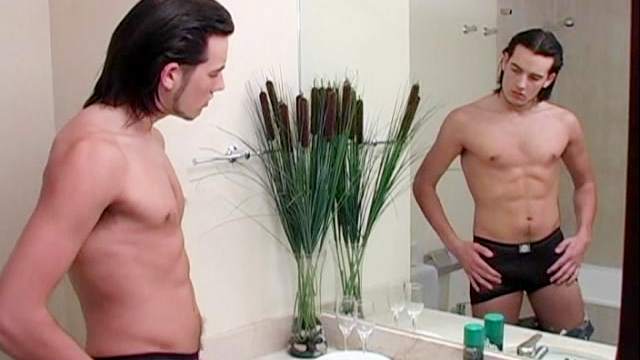 Brunette Carlos Morales is touching his abs