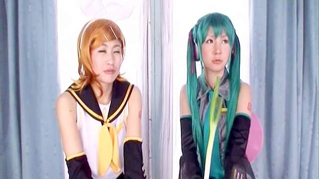 Two cosplay Asians are banging in a hardcore mode