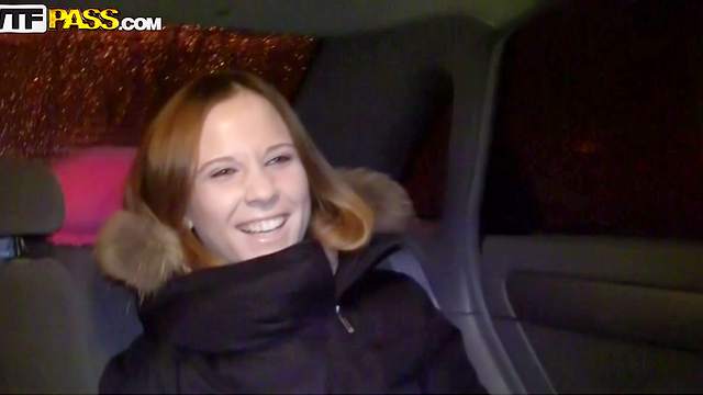 Smiling beauty is sucking black dick in the car