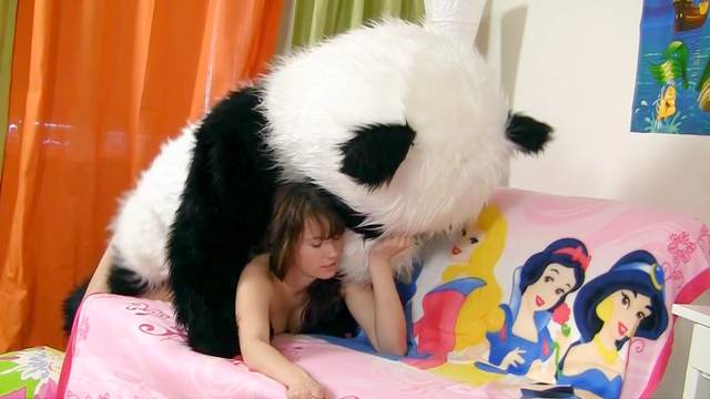 Cock-sucking brunette is giving a blowjob for panda