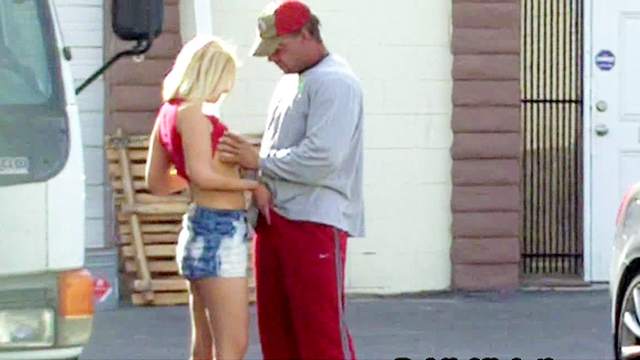 Slender blonde is sucking dick on public