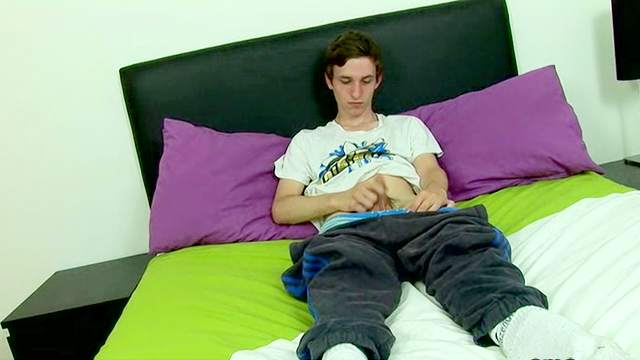 Dark-haired gay is masturbating his hard dick