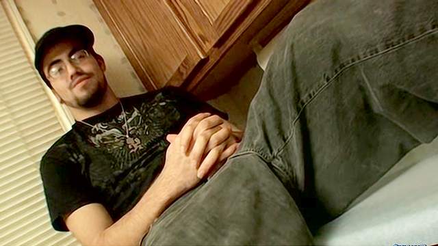 Tanned gay with big dick is wanking in the kitchen