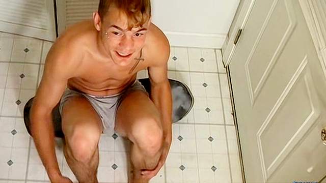 Sexy gay is sitting and masturbating his hard dick