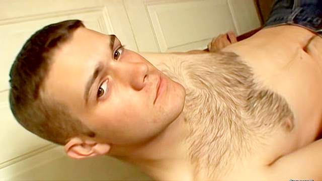Sexy gay with cute face is masturbating his dick