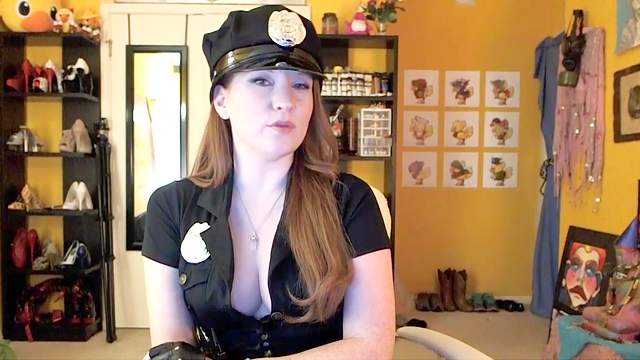 Police chick is playing with her pussy