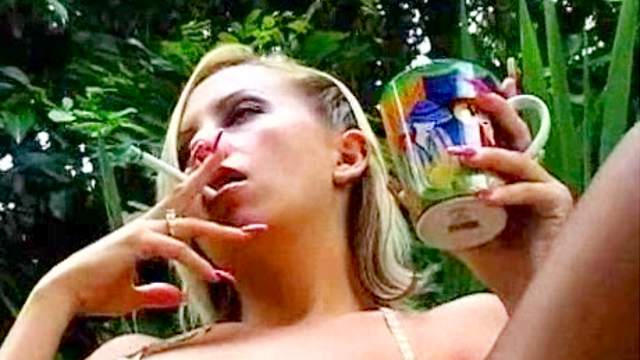 Blonde babe is smoking outdoors in fetish clip