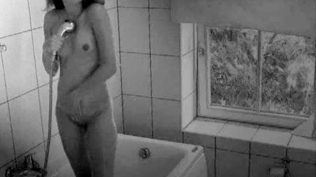 Wet tall teen showers sensually