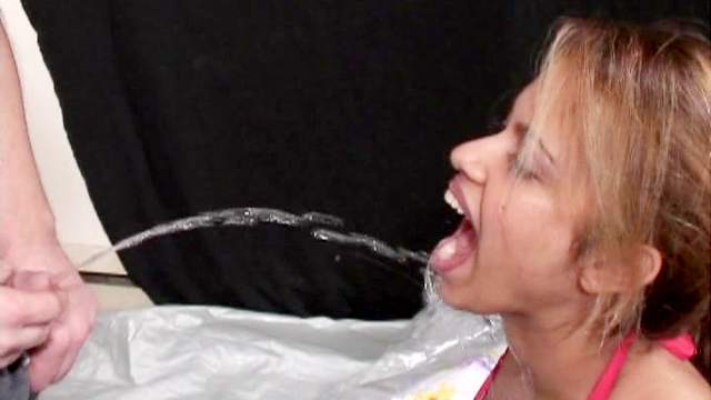 Blonde swallows piss and sperm!