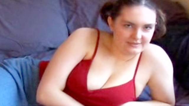 Very fat girl is lying naked and masturbating