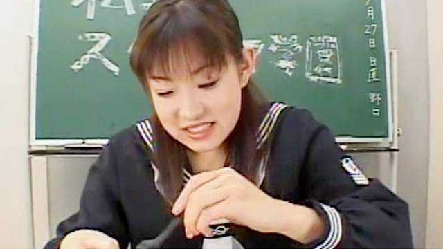 Sweet Asian is sucking dick in the classroom