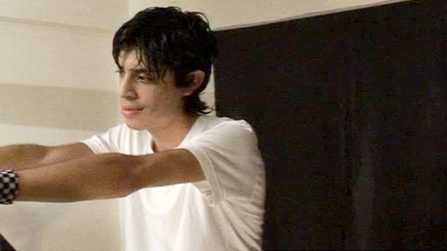 Skinny male teen plays with his dick in the gym