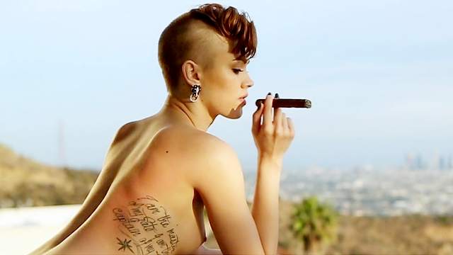 Fancy Britt is smoking that cigar