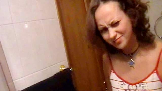 Russian brunette is fucking in the bathroom