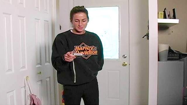 Tanned chick Anna is taking a hot shower