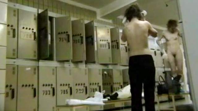 Alluring babe is getting naked in the locker room