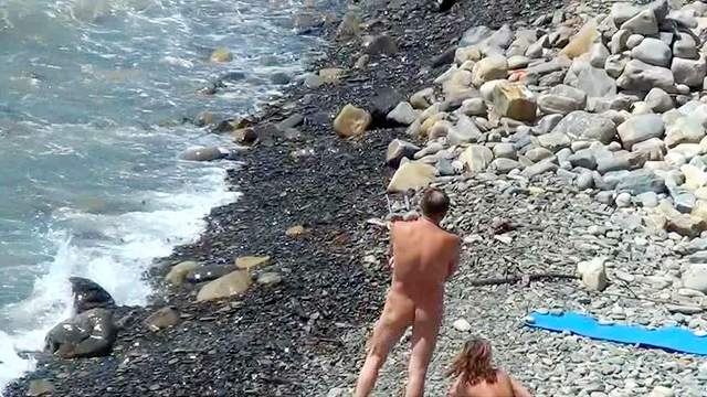 Sexy babes are posing naked on the nudist beach