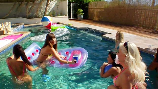 Hardcore brunettes are posing naked at the pool