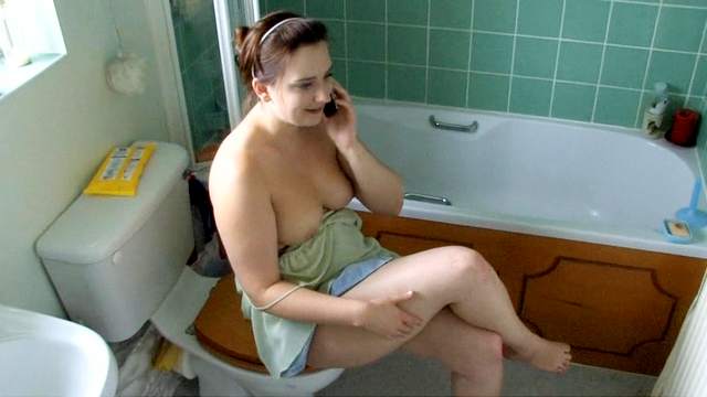 Busty babe Jenny is talking on the phone
