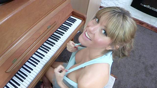 Brook is playing on piano and masturbating