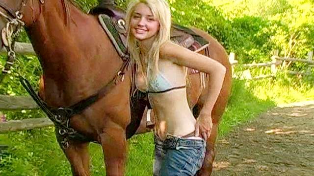 Blonde Ania poses on the horse so sexy