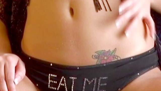 Tattooed babe Cassia Riley pokes her puss