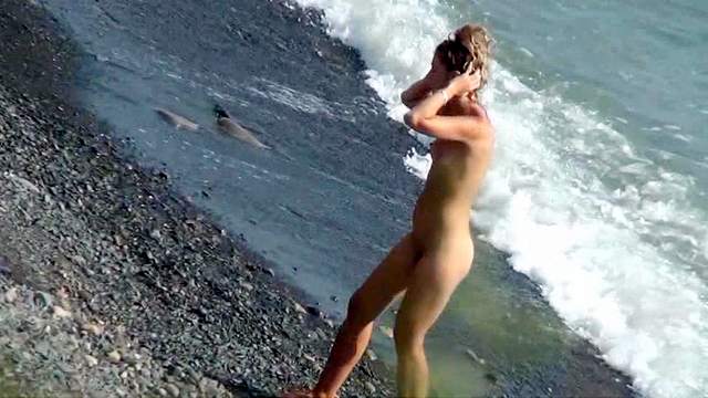 Skinny slender blonde shows off herself