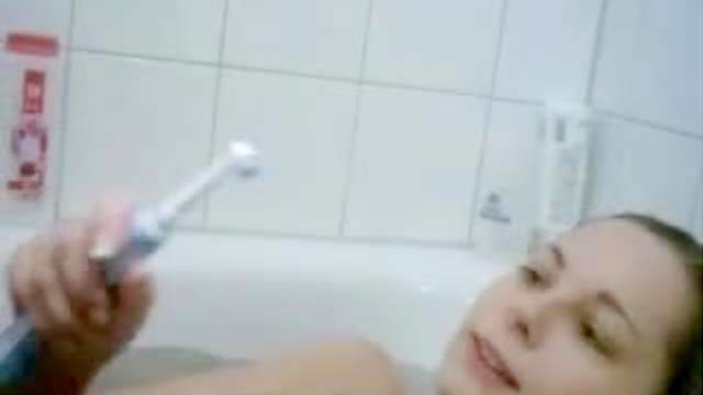 Electric toothbrush masturbation with amateur