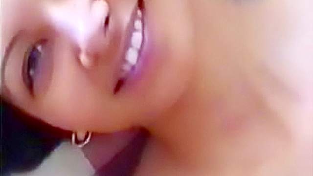 Smiling amateur striptease and masturbation