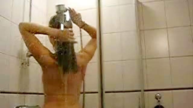 Lovely girl wet in the shower