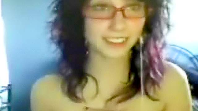 Nerdy webcam girl shows her tits
