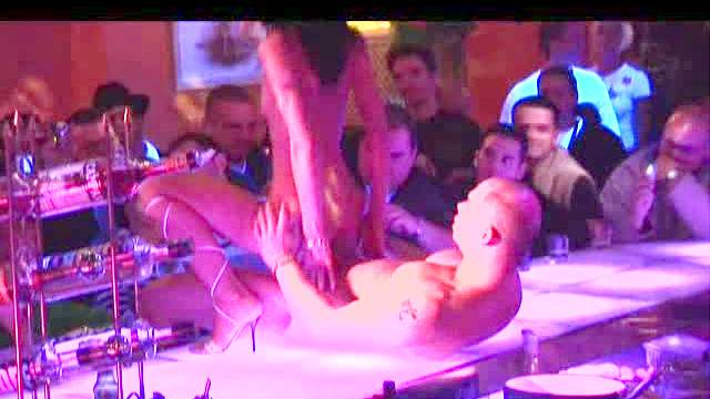 Male and female strippers fuck on stage