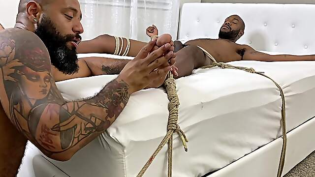 Needy gay men share bondage together