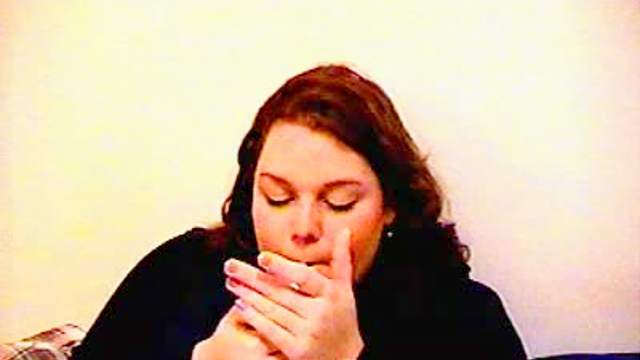 Chubby mature chick smokes on camera