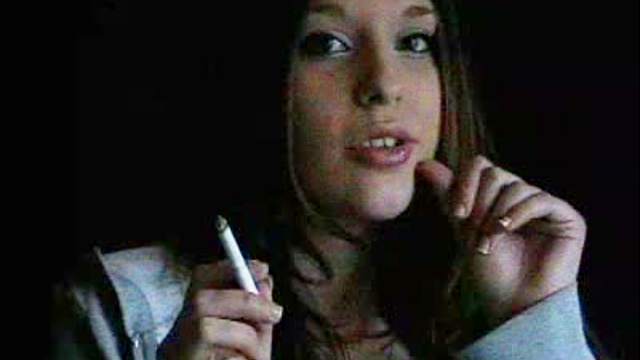 Pregnant slut is smoking in the room