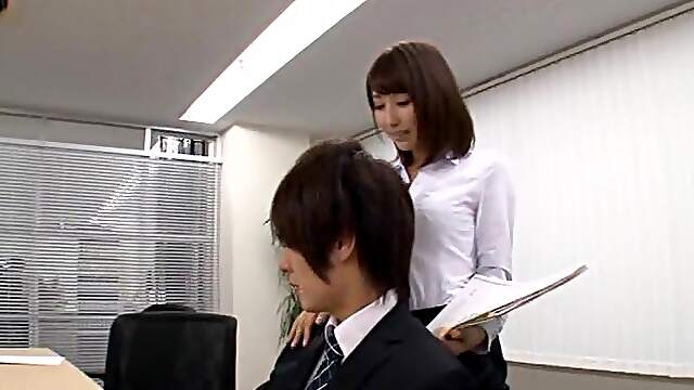 Japanese office babe devours whole cock at the office