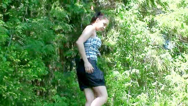 She releases her urine in the woods