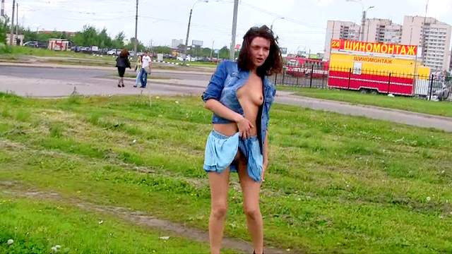 Lovely teen in short skirt flashes outside