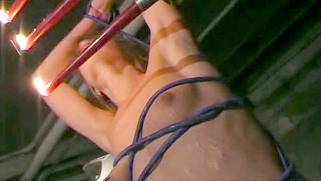 Hot wax over her whipped bound body