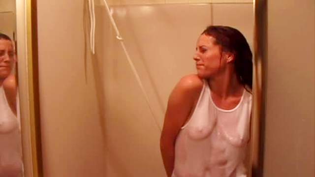 Whimsical and tied brunette is taking shower