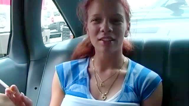Redhead and busty Brandi Mae is doing blowjob in the car